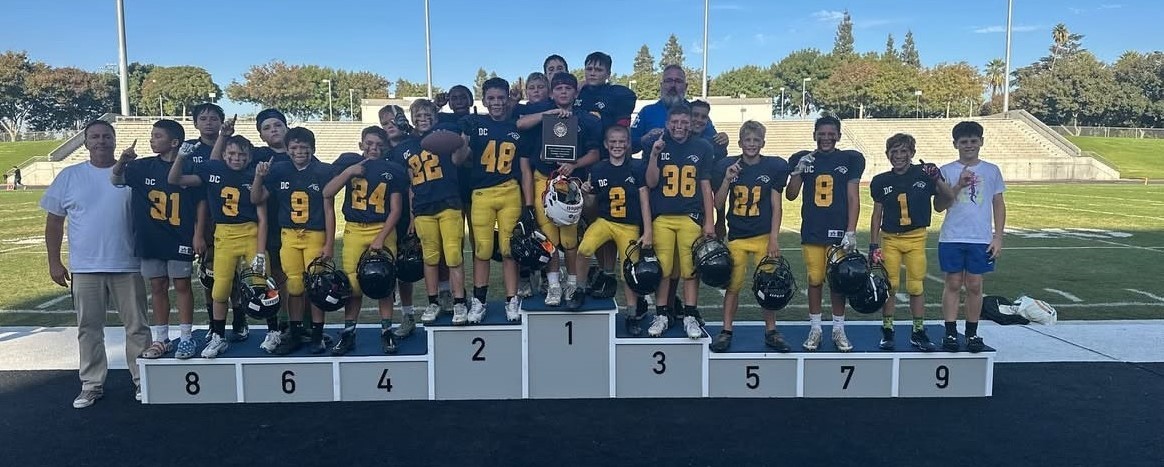 Football on podium at districts