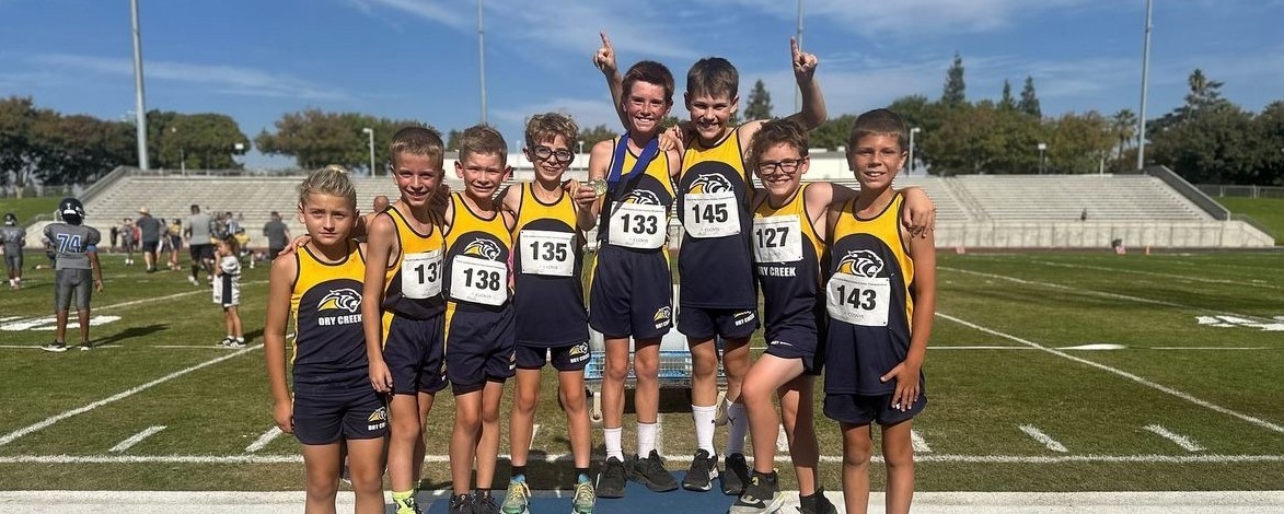 4th grade boys cross country on the podium at districts